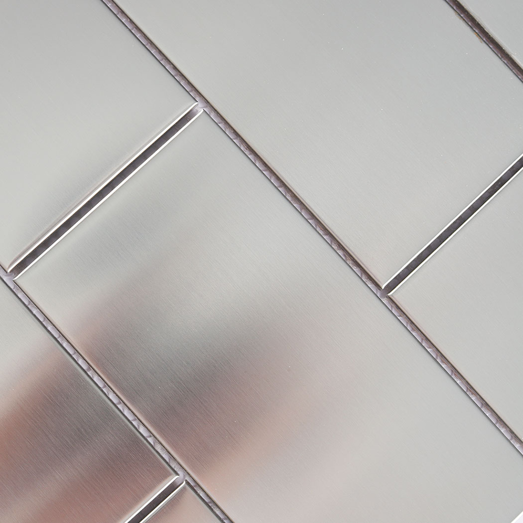 Brushed metal subway tile surface detail with fine linear texture