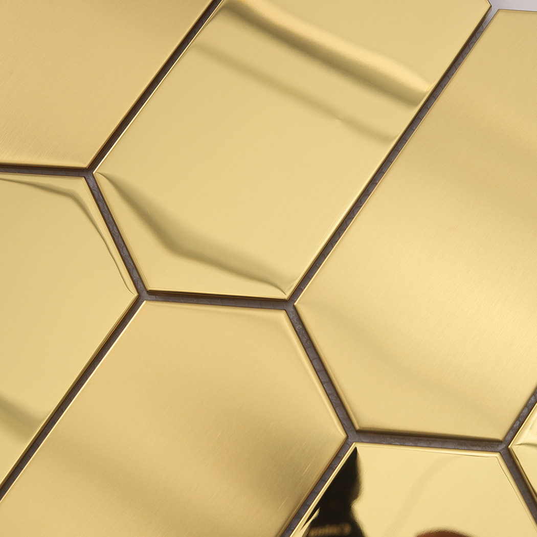 Close up edge detail of gold hexagon mosaic tile brushed mirror finish