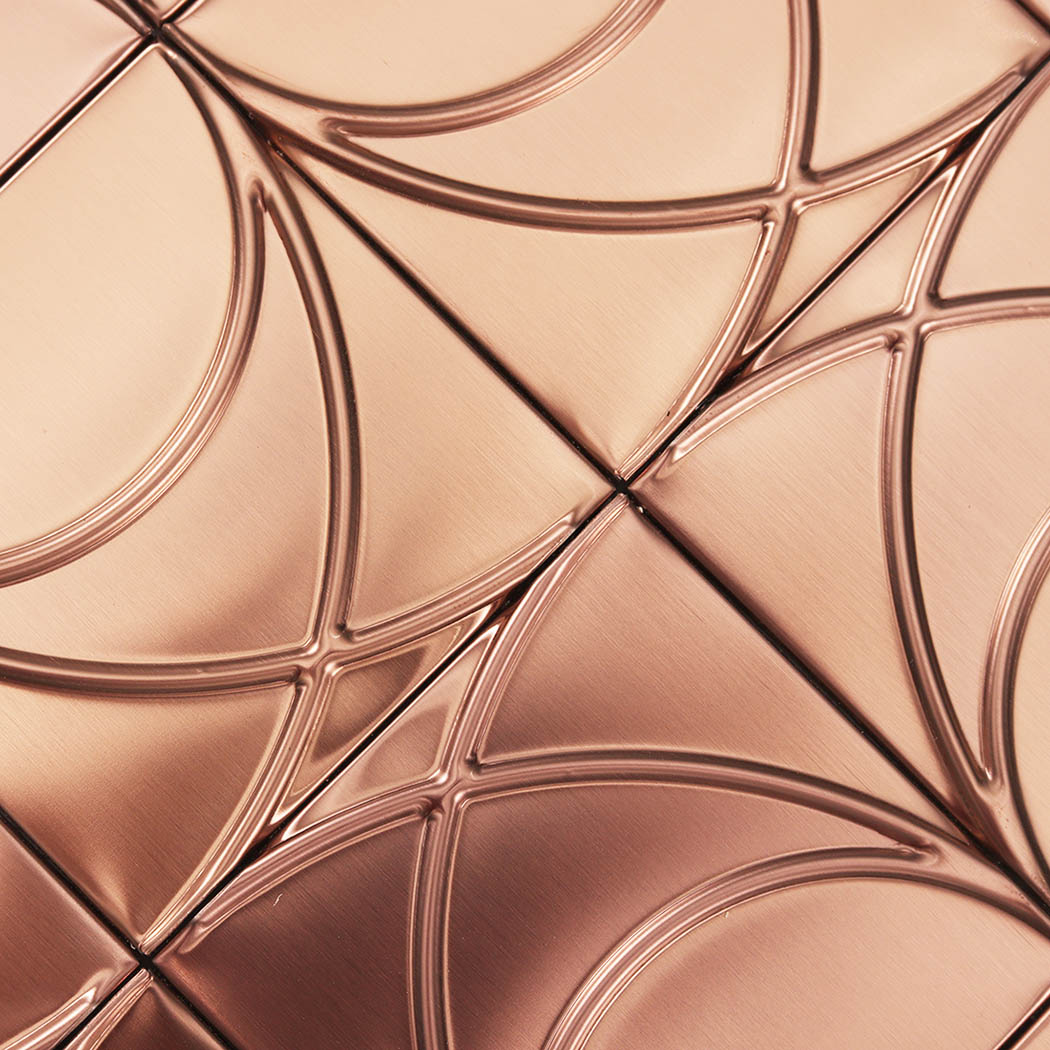 Close-up of brushed rose gold stainless steel square pattern mosaic surface