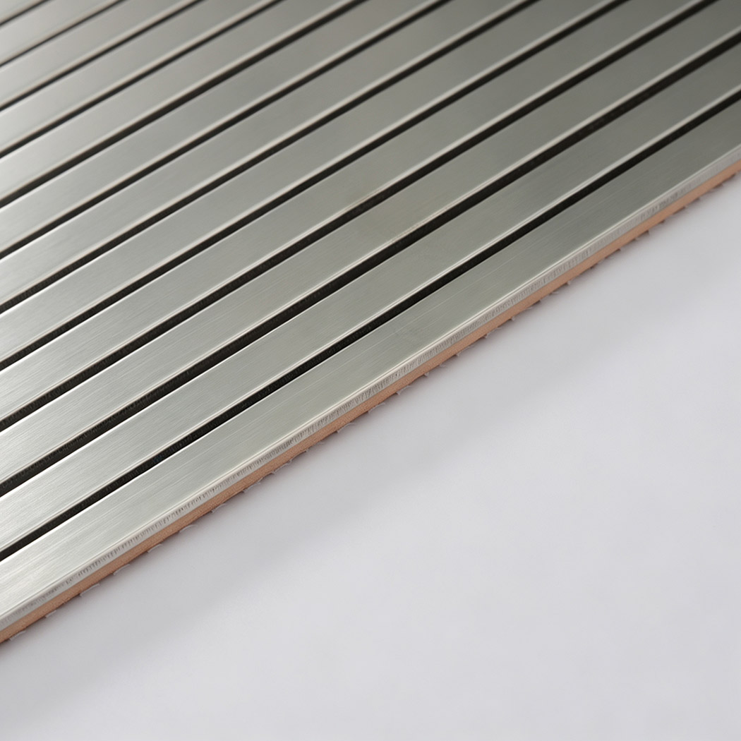 Edge detail of brushed silver stainless steel ribbon tile sheet