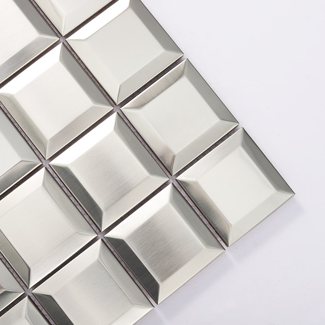 Close up of brushed silver beveled stainless steel mosaic tile corner