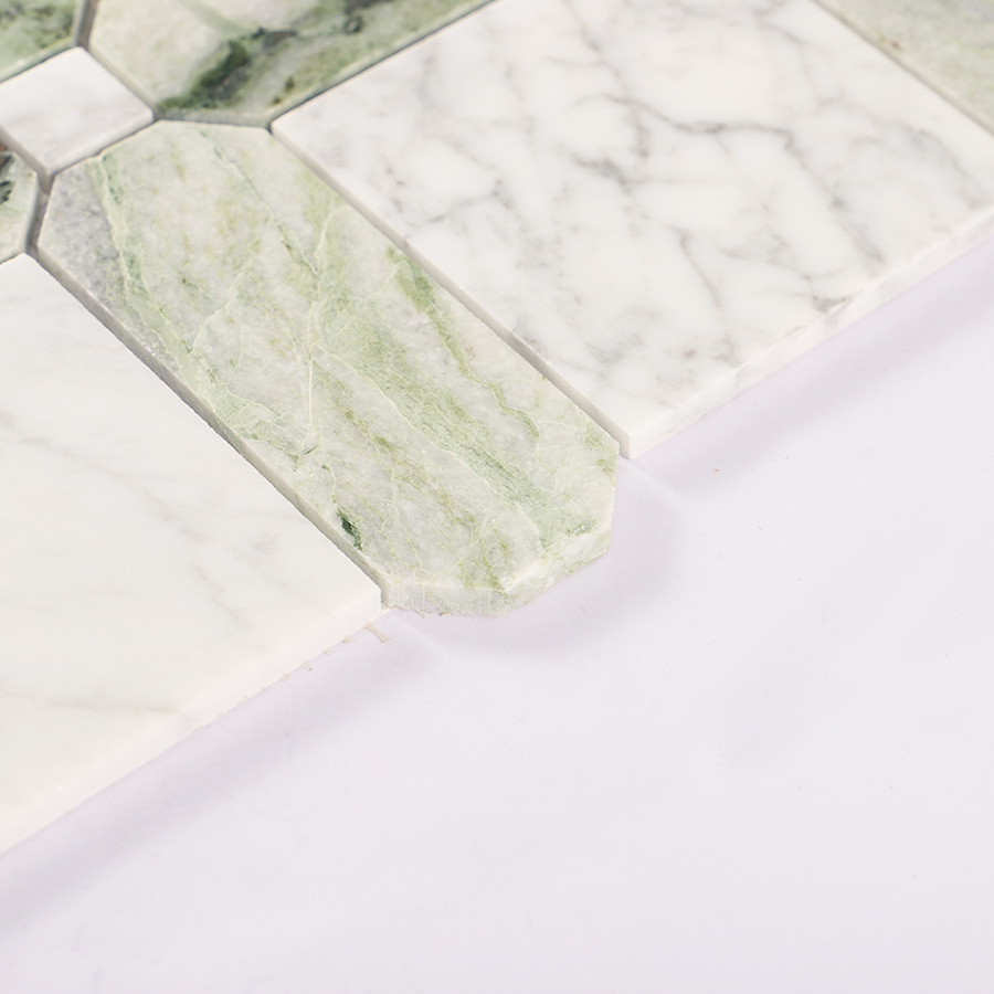 Edge close-up of Carrara white and green geometric marble mosaic tile