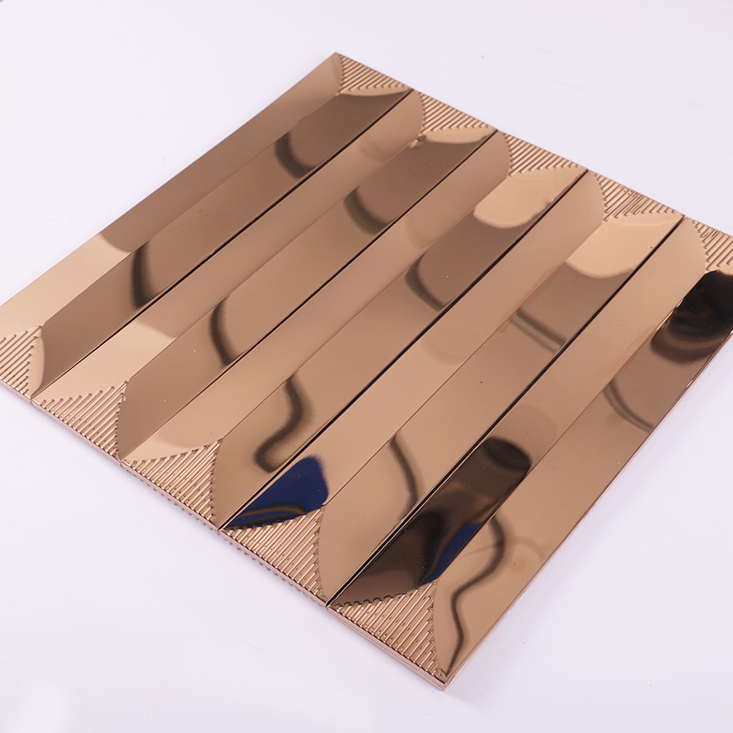 Angled perspective of champagne gold stainless steel mosaic tile