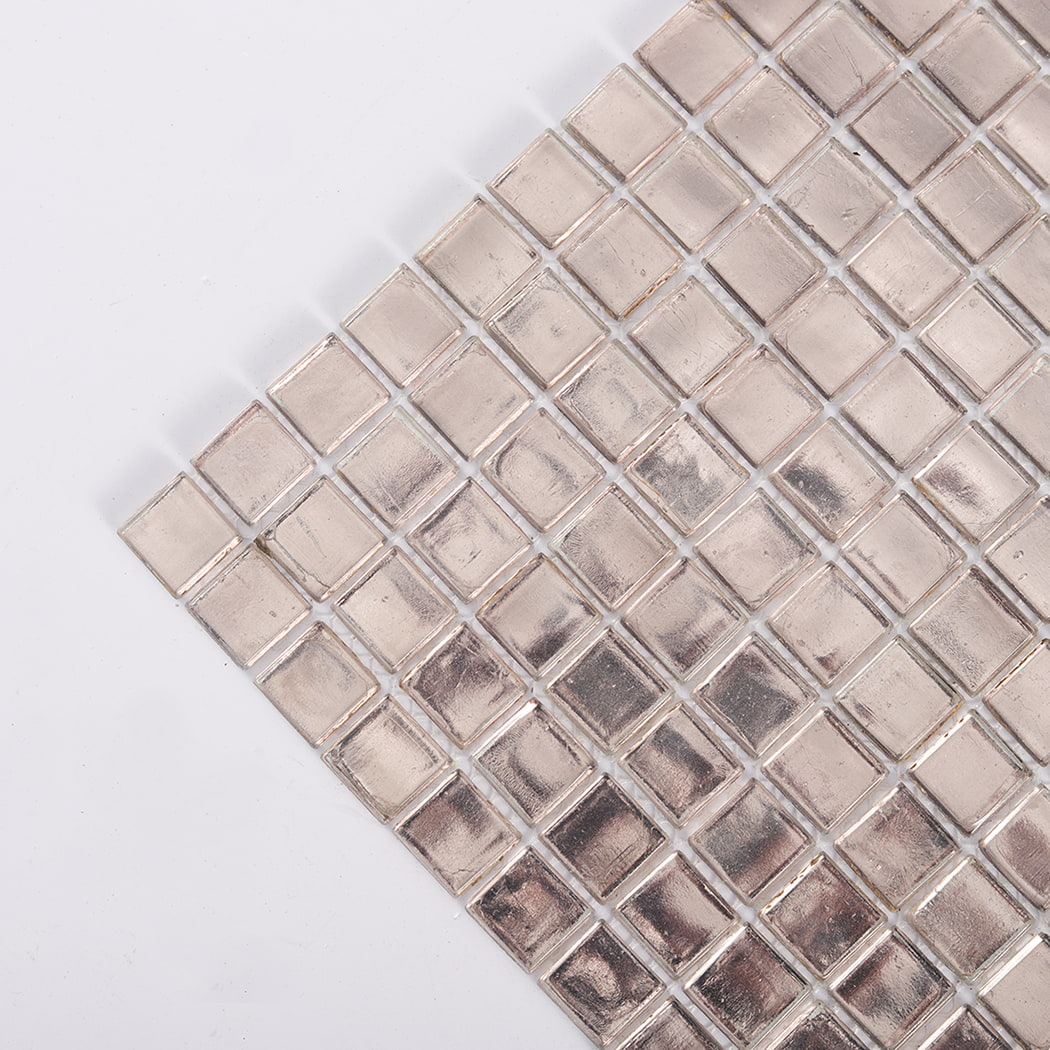 Corner close up of champagne silver foil glass square mosaic tile sheet