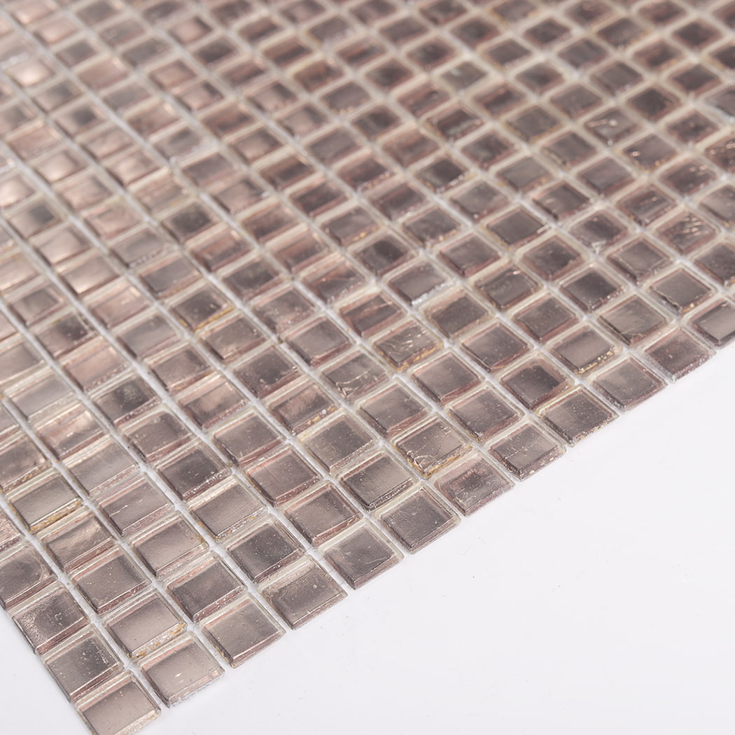 Close up of champagne silver foil glass square mosaic tiles showing foil texture