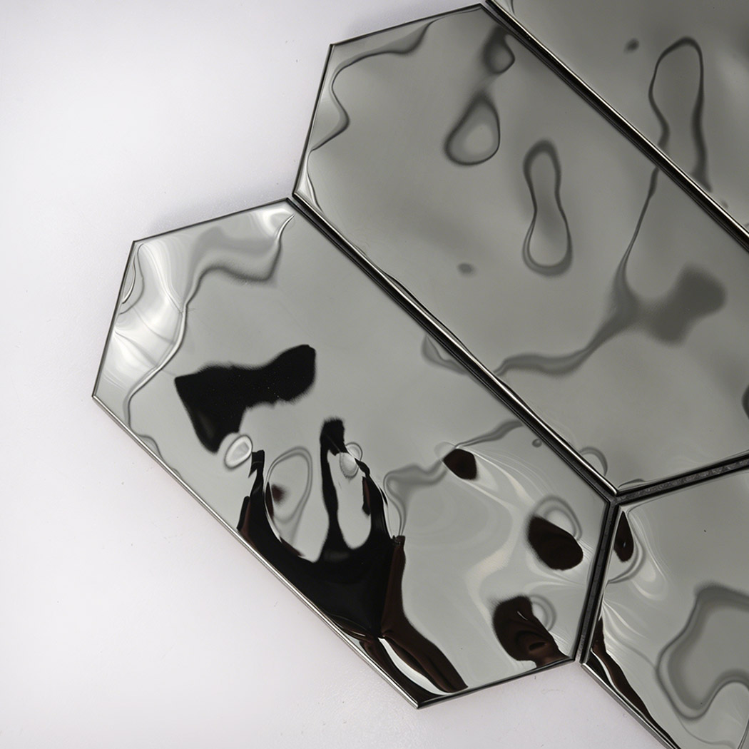 Close up of glossy black hexagon mosaic tile with mirror-like reflections