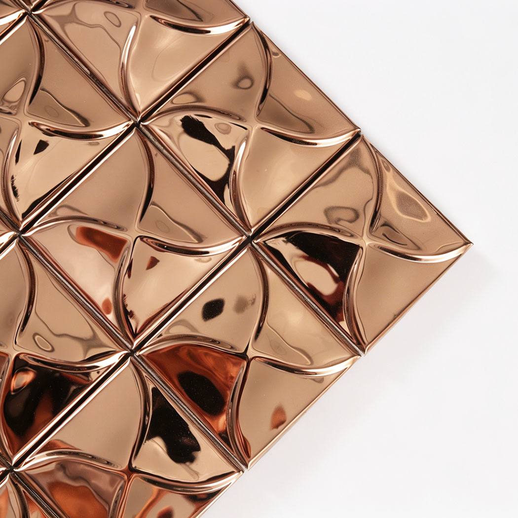 Close up of rose gold 3D square mosaic tile corner with glossy curved lines