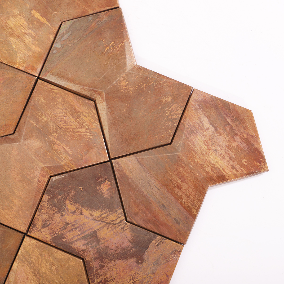 Close-up highlighting the embossed metallic texture and warm copper tones