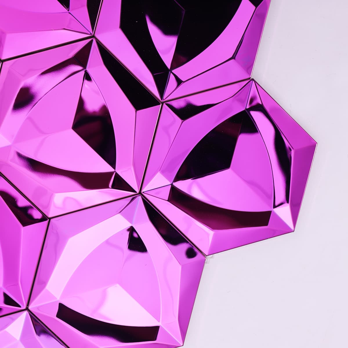 Detailed texture of mirrored pink 3D hexagon metal tiles