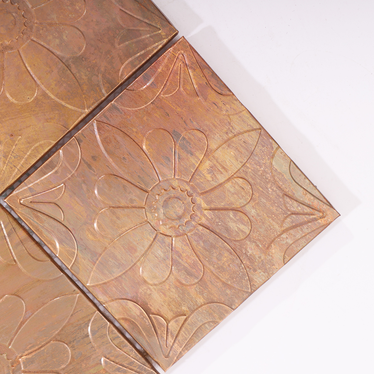 Close-up showcasing the engraved patterns and aged copper finish