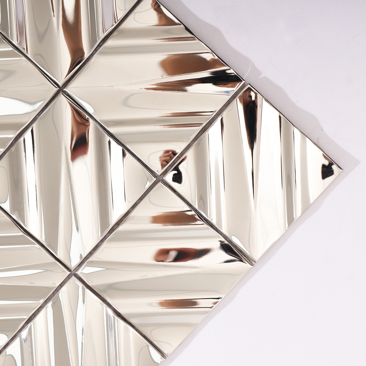 Detailed view showing the sleek metallic surface and sharp angles