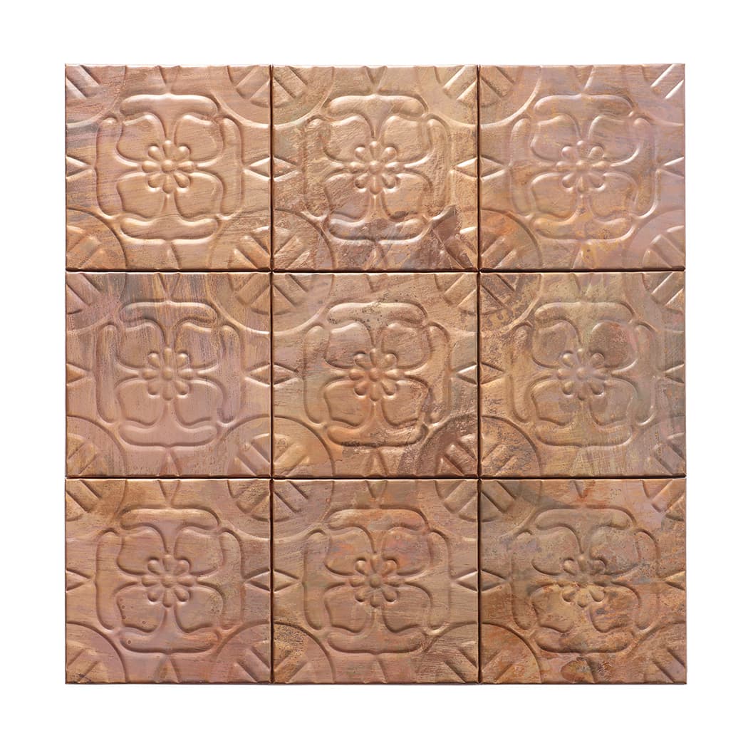 Front view of copper embossed four petal flower mosaic tiles