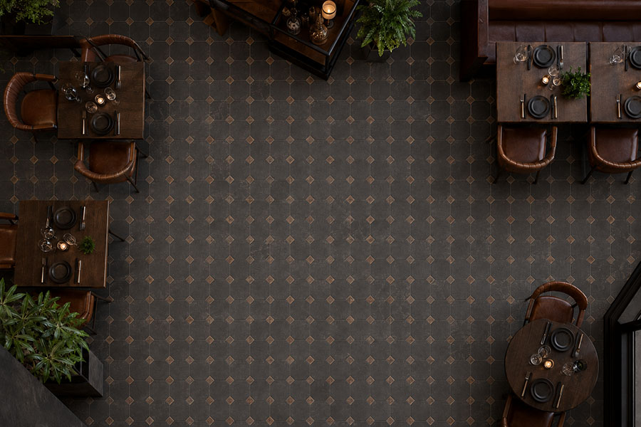 Top view of dark brown octagon industrial floor tiles in a vintage restaurant