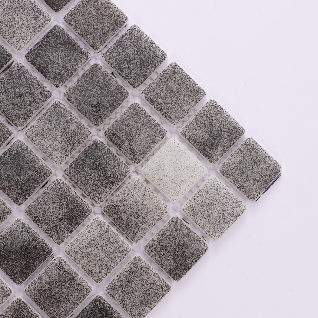 Close up of dark grey recycled glass mosaic tile corner details
