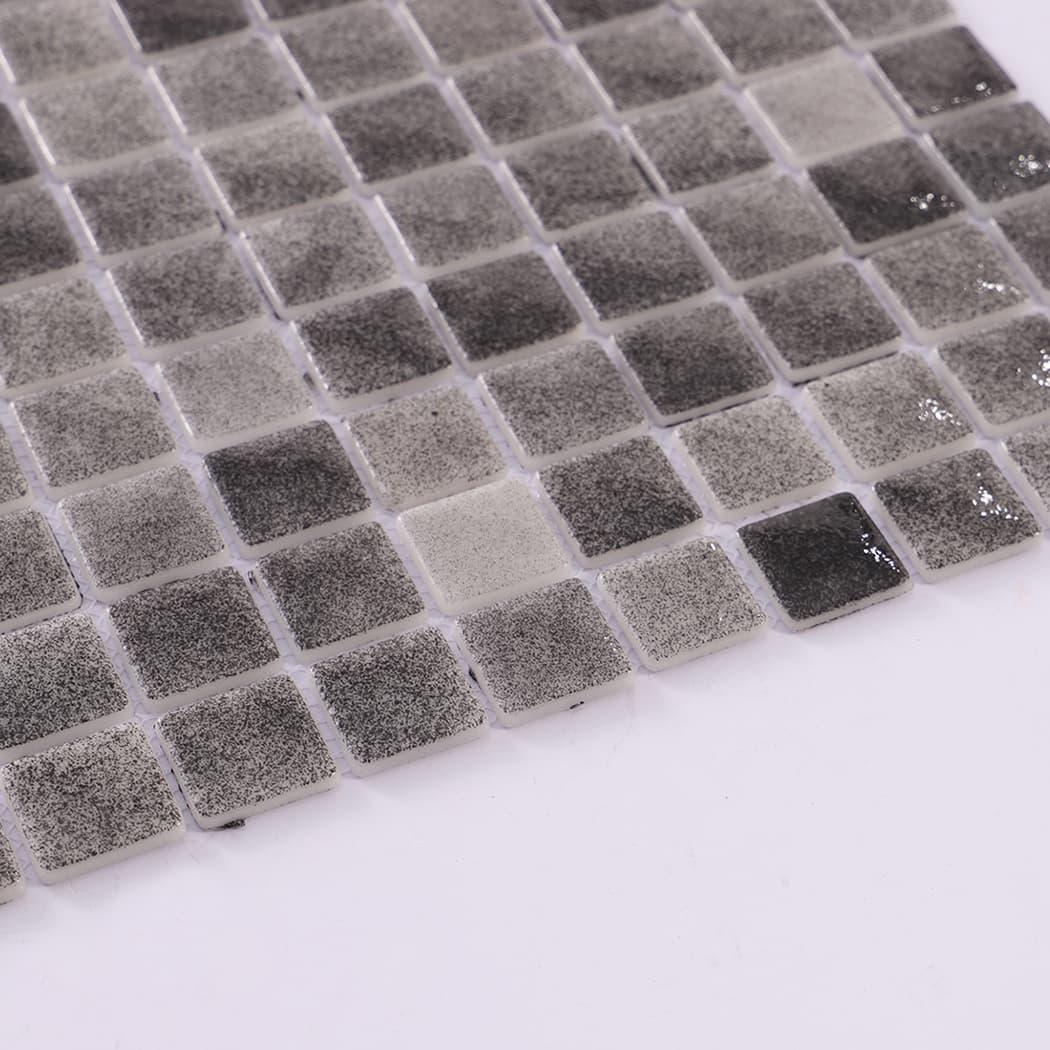 Side view showing the thickness of dark grey recycled glass mosaic tiles