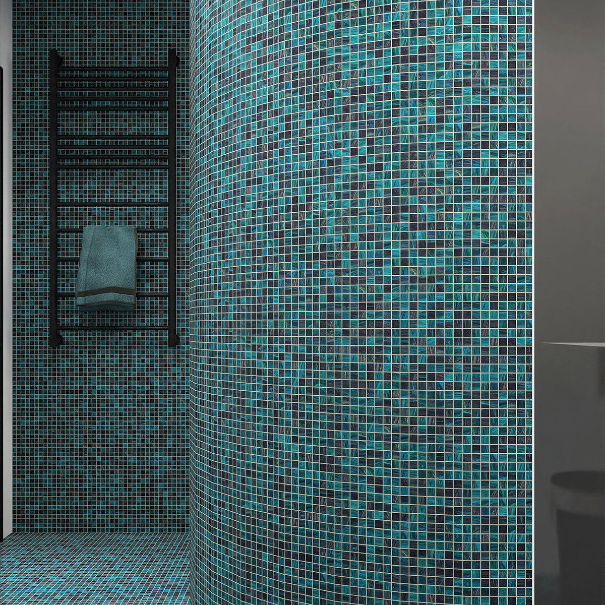 Dark teal mosaic tiles on curved bathroom walls, adding depth with rich blue-green hues