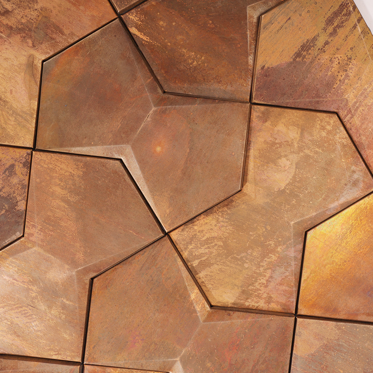 Detailed shot showing the geometric relief and dynamic reflections