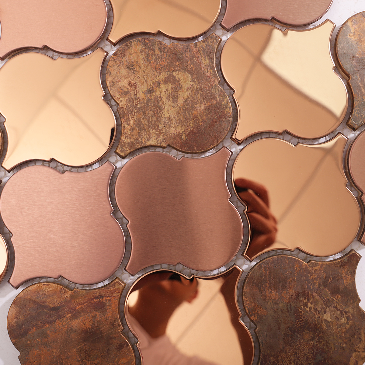 Detailed shot emphasizing the polished rose gold and brushed copper contrast.