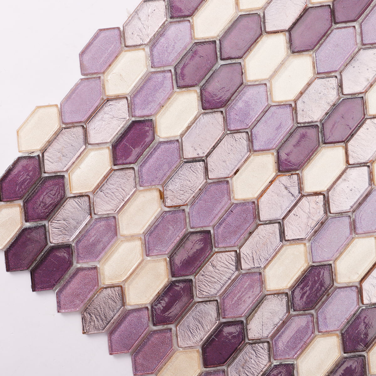 Detailed view of hexagonal purple and cream tiles with a glossy finish