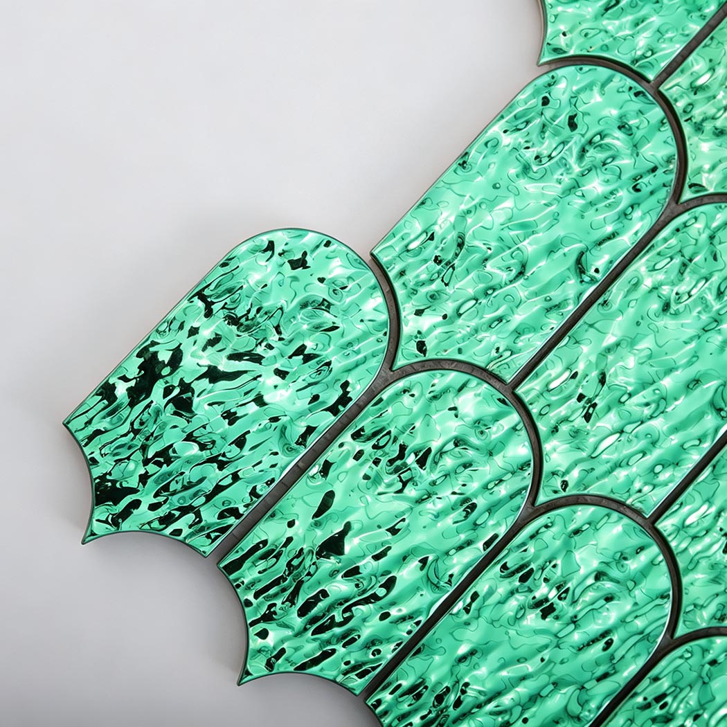 Glossy emerald green ripple scallop metal tile surface detail