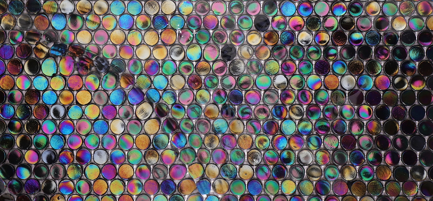 Full sheet of round iridescent glass mosaic tile for pool designs