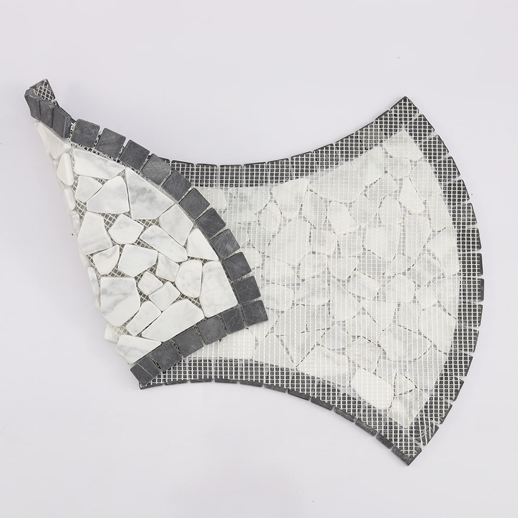 View of the flexible mesh backing on the underside of a pebble stone mosaic tile sheet.