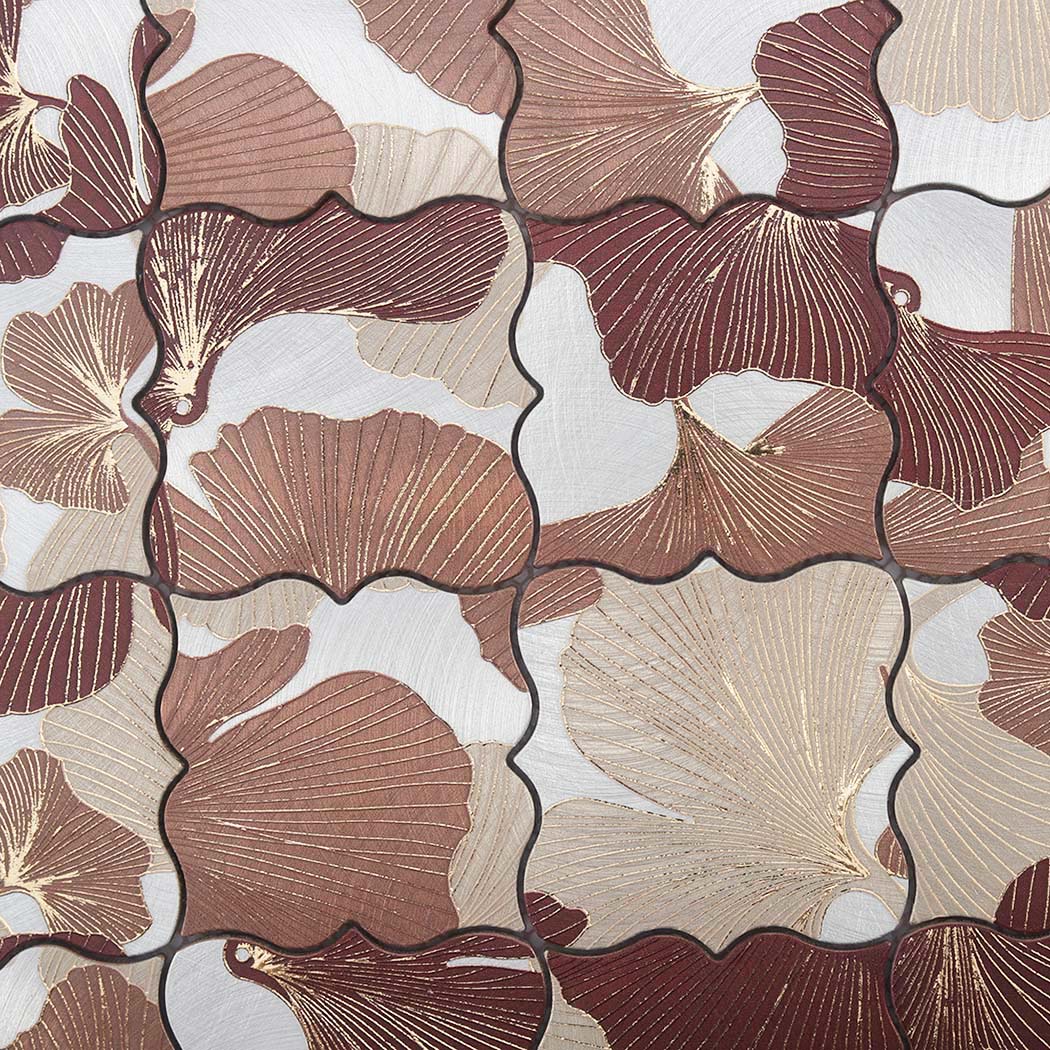 Close-up of brown beige and burgundy floral aluminum mosaic tile surface