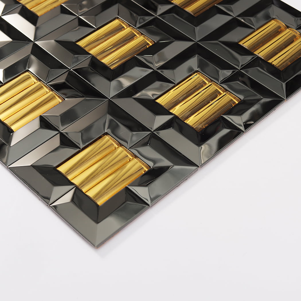 Perspective view of a mosaic tile sheet showing the raised 3D geometric texture and shine.