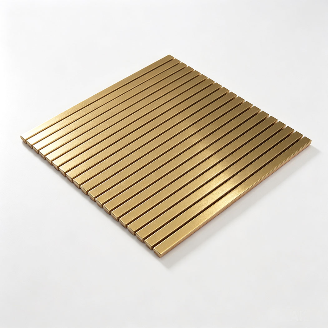 Angled view of gold brushed stainless steel linear tile sheet