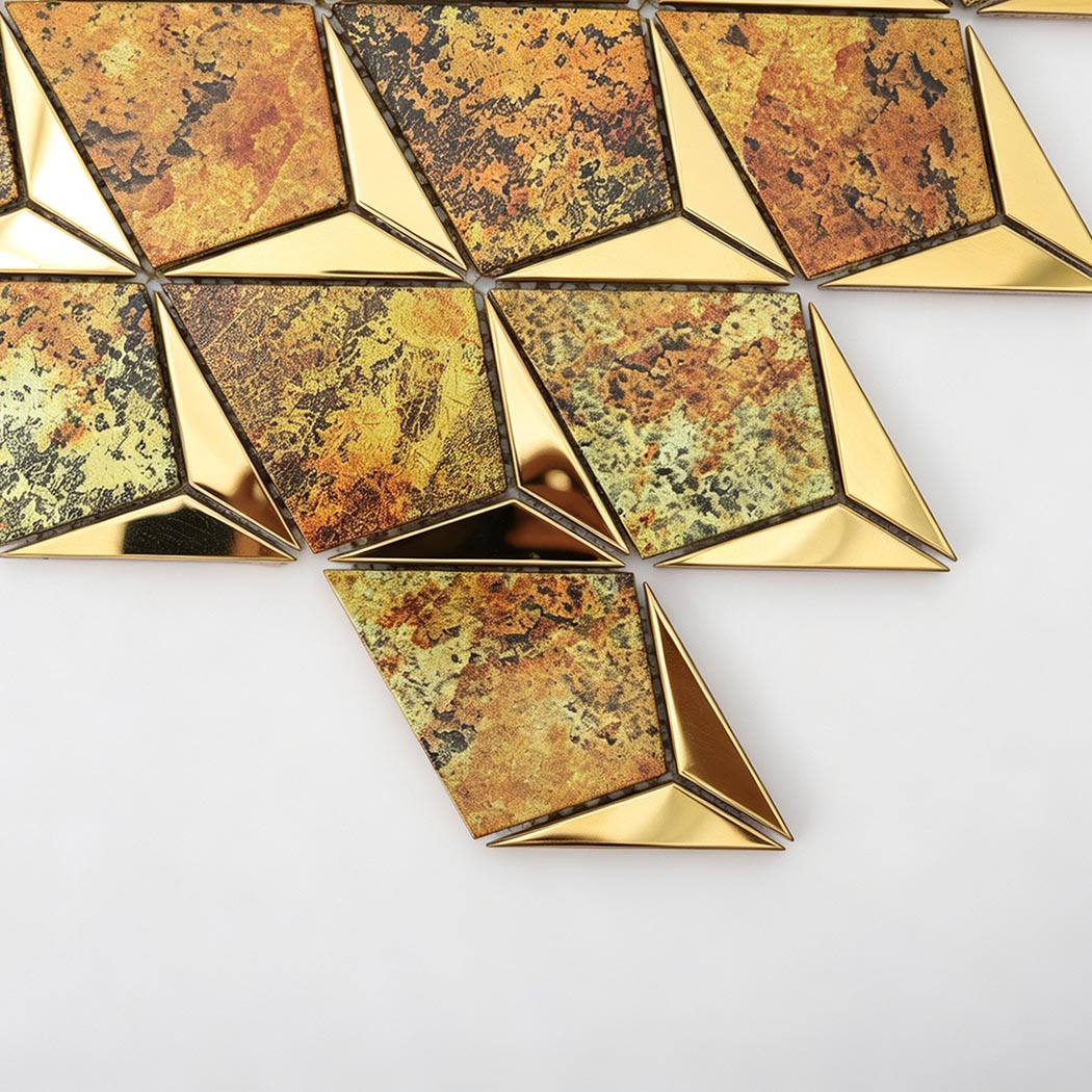 Close up of gold metal and antique finished diamond mosaic tile