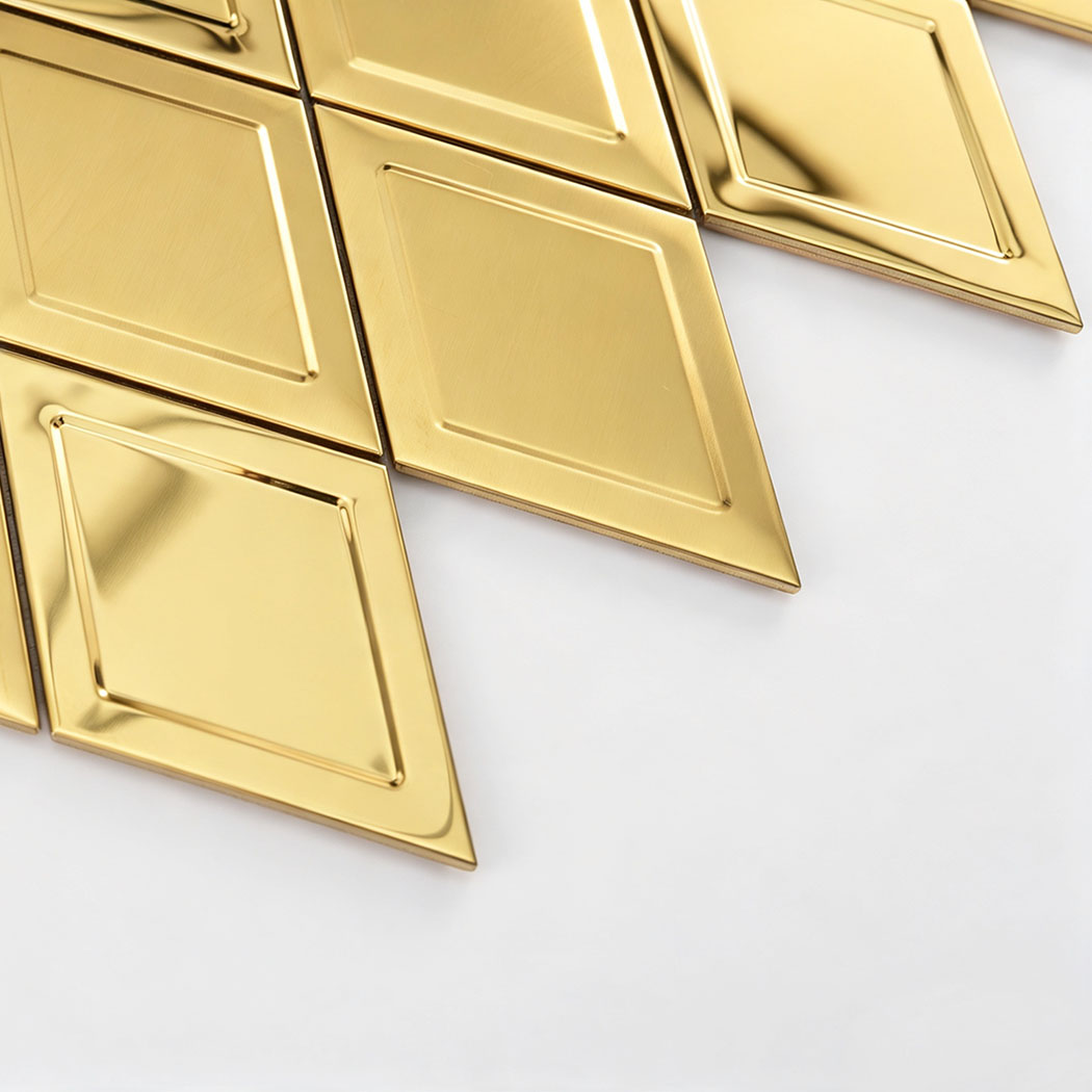 Angled view showing gold diamond stainless steel mosaic tile surface and thickness