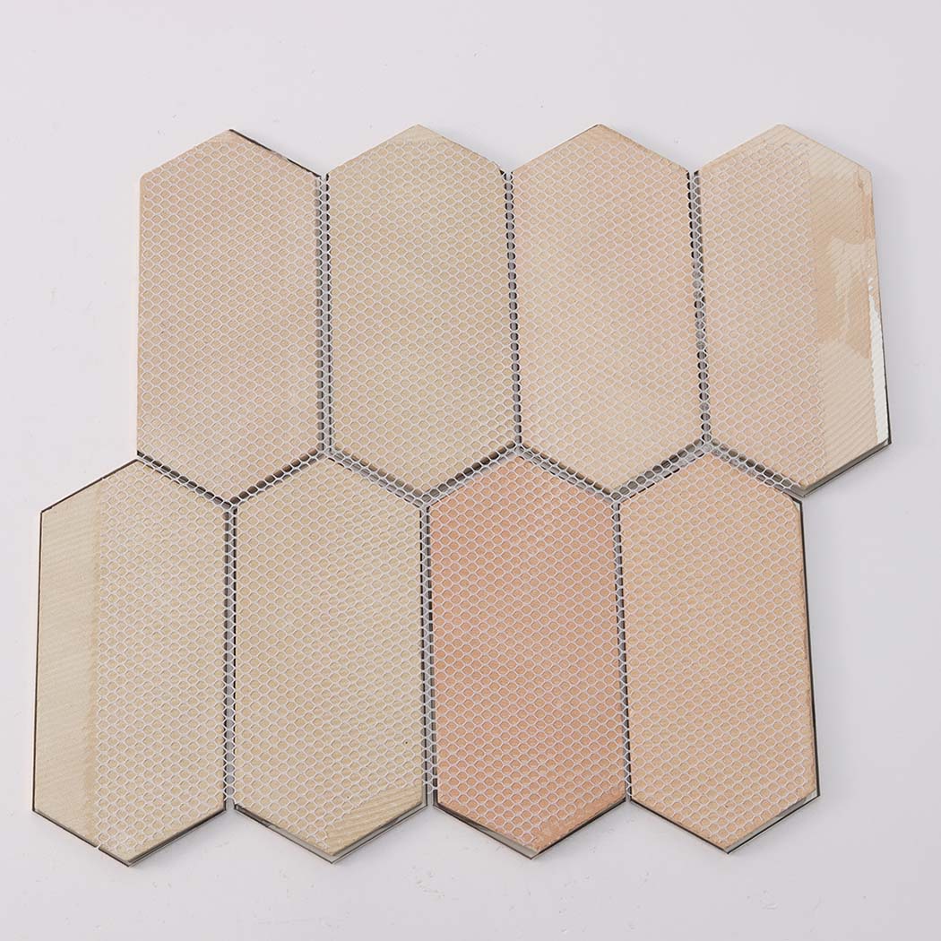 Back view of gold elongated hexagon mosaic tile sheet with mesh backing