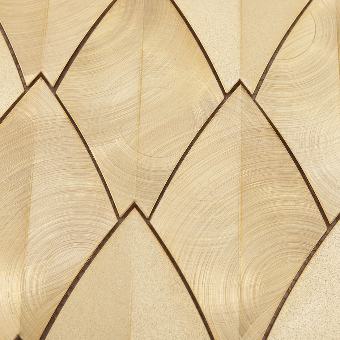 Close-up of gold feather aluminum mosaic tile pattern with brushed and textured finishes
