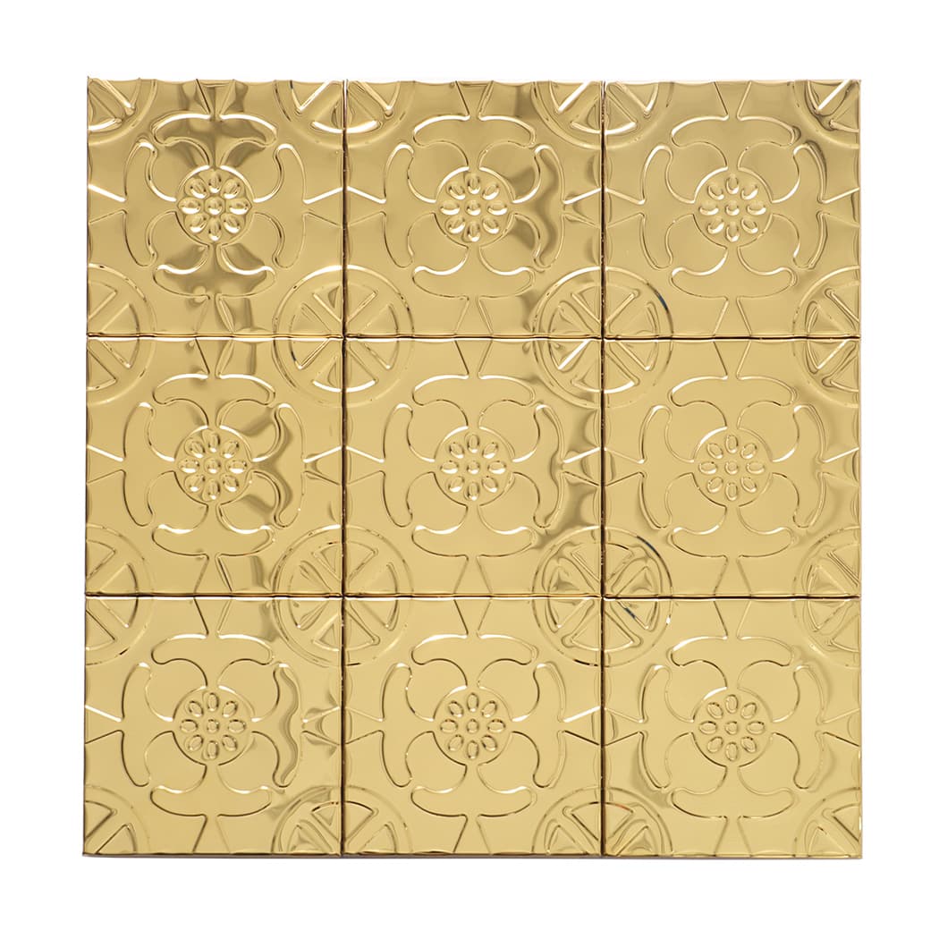 Front view of a gold embossed floral metal mosaic tile sheet in a square layout.