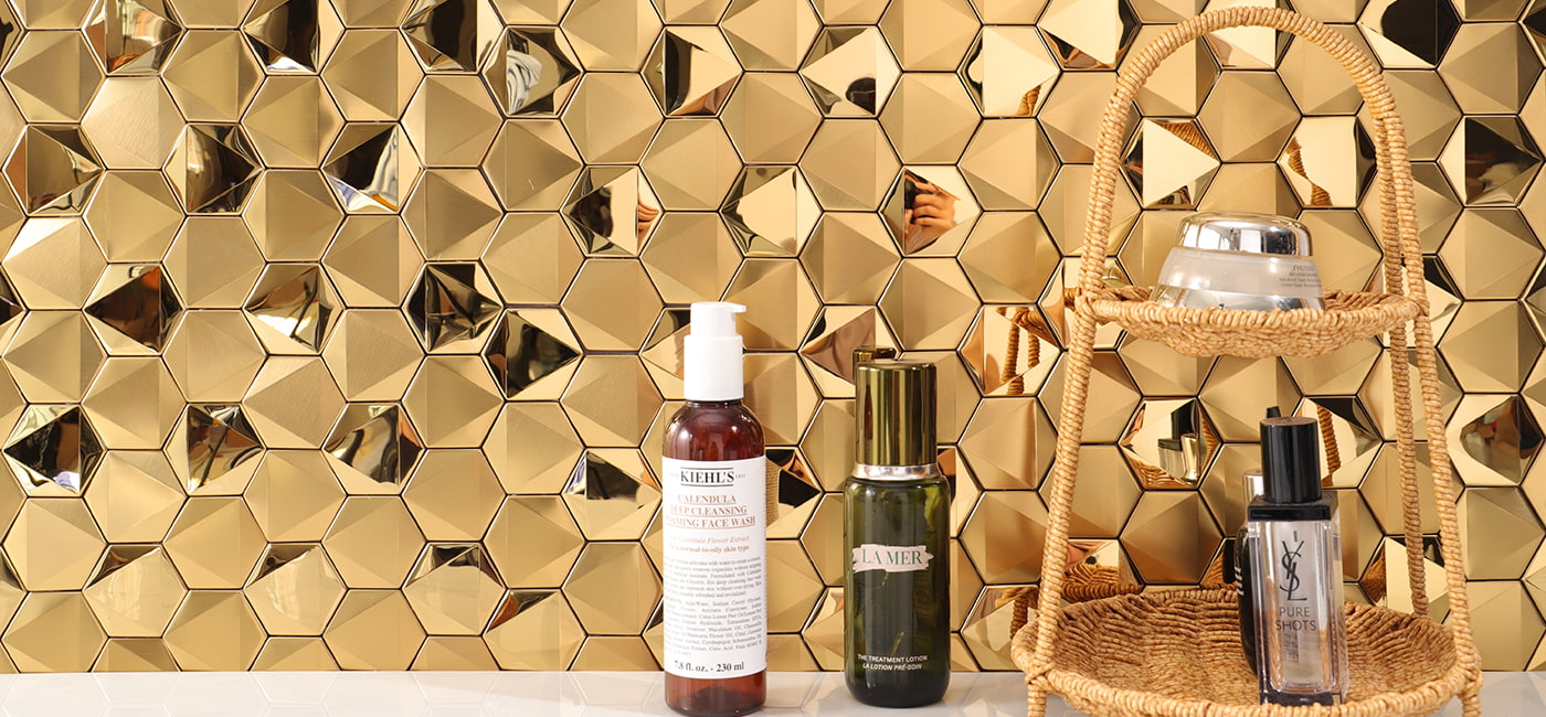 Close-up of gold hexagonal metallic tiles, showcasing modern textures