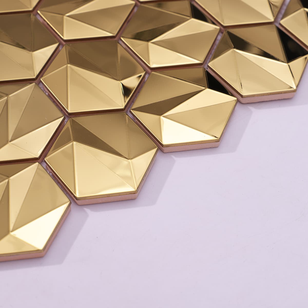 Side profile of raised 3D golden hexagon mosaic pieces