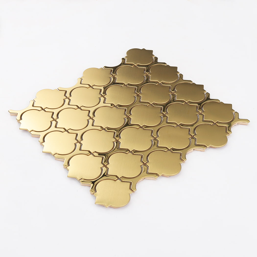 Angled view of a complete gold arabesque lantern mosaic tile sheet.