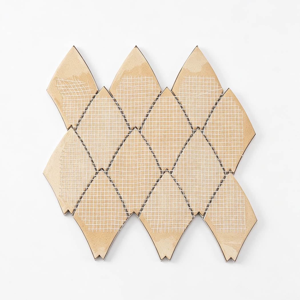 Back view of gold leaf aluminum mosaic tile sheet with mesh backing