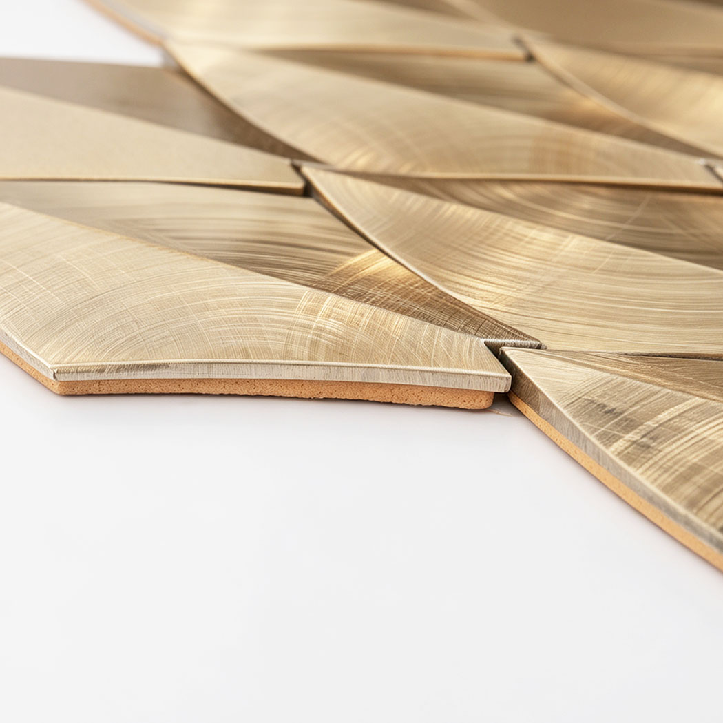 Side view of gold leaf aluminum mosaic tiles showing layered construction