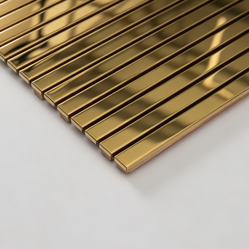Edge detail of gold mirror stainless steel ribbon tile sheet