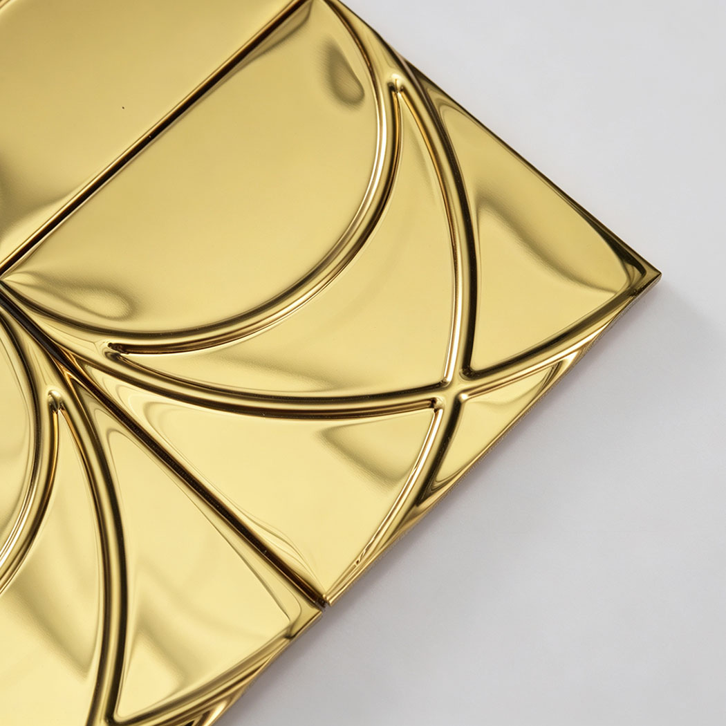 Corner close-up of gold mirror stainless steel square pattern mosaic tile
