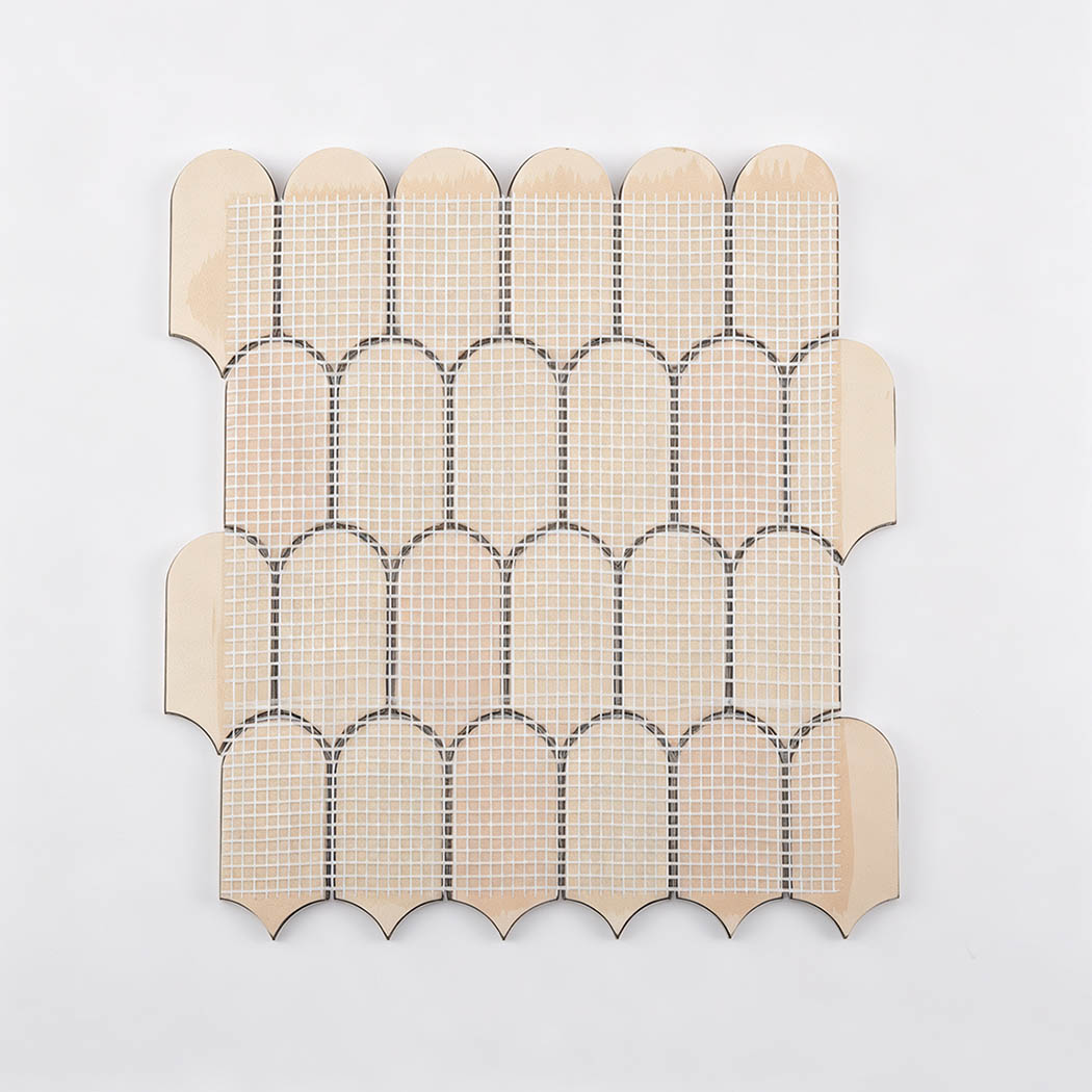 Back view of gold ripple fan metal mosaic tile sheet with mesh backing