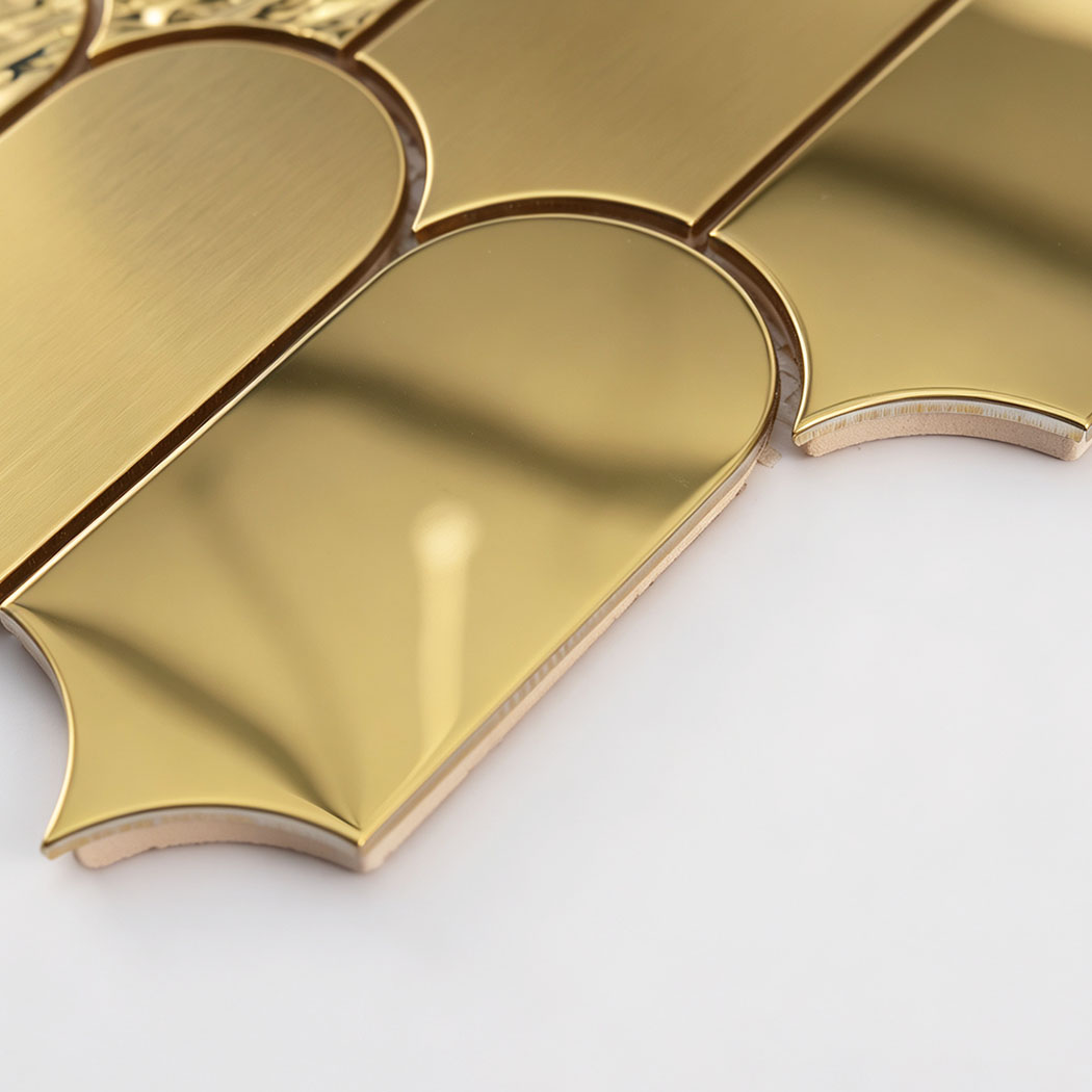Side detail showing the thickness of gold ripple fan metal mosaic tiles