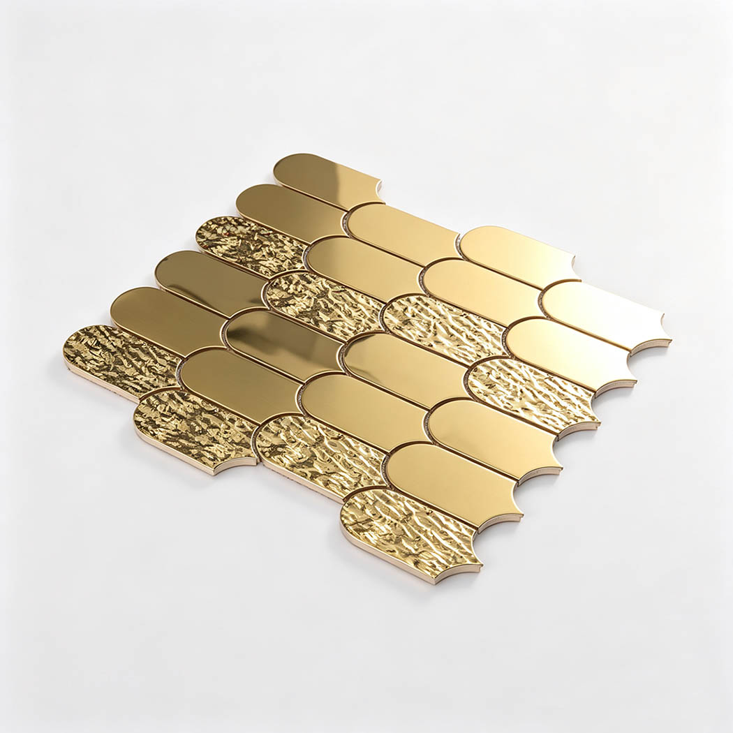 Angled view of gold ripple and smooth fan metal mosaic tile sheet