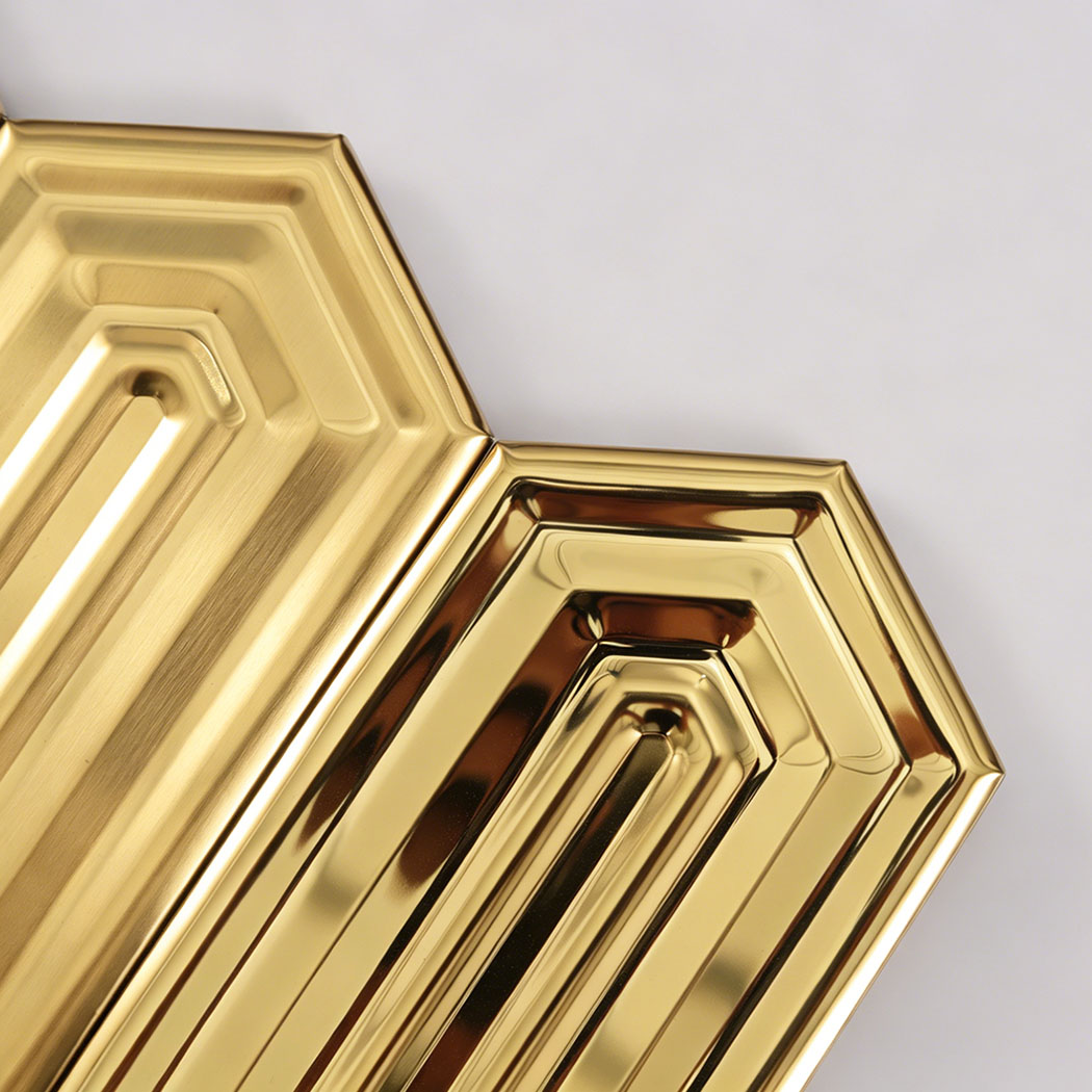 Gold stainless steel picket mosaic tile close up showing brushed and mirror finish texture