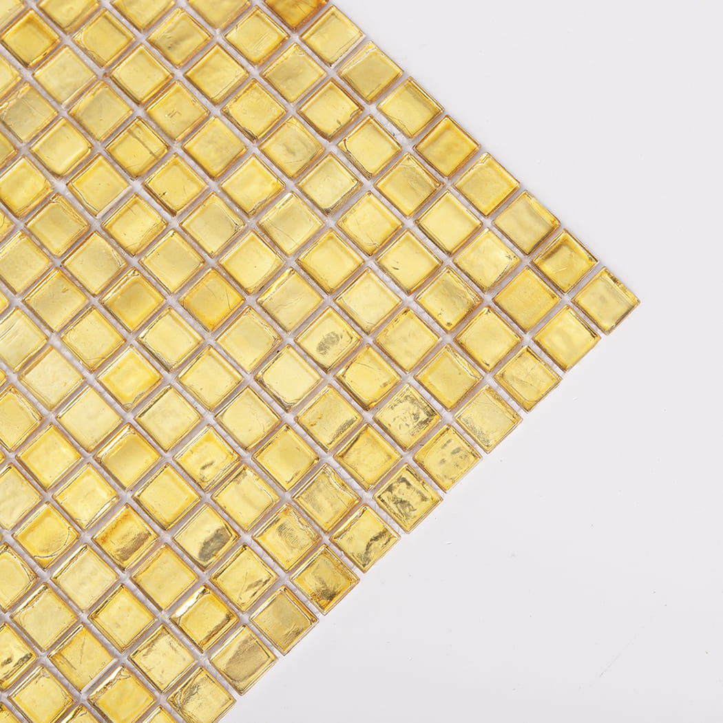 Corner close up of gold foil glass square mosaic tile sheet