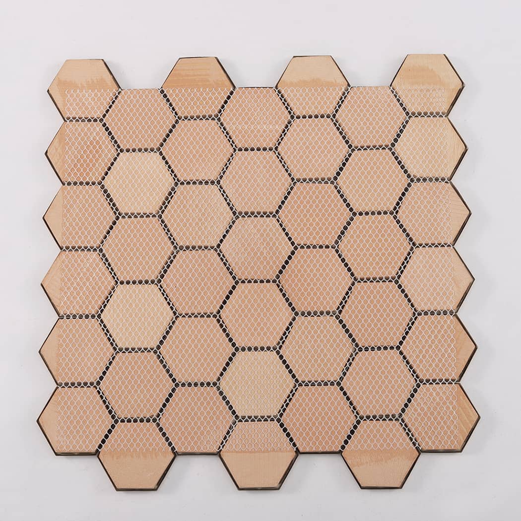 Back view of gold hexagon metal mosaic tiles mounted on mesh backing