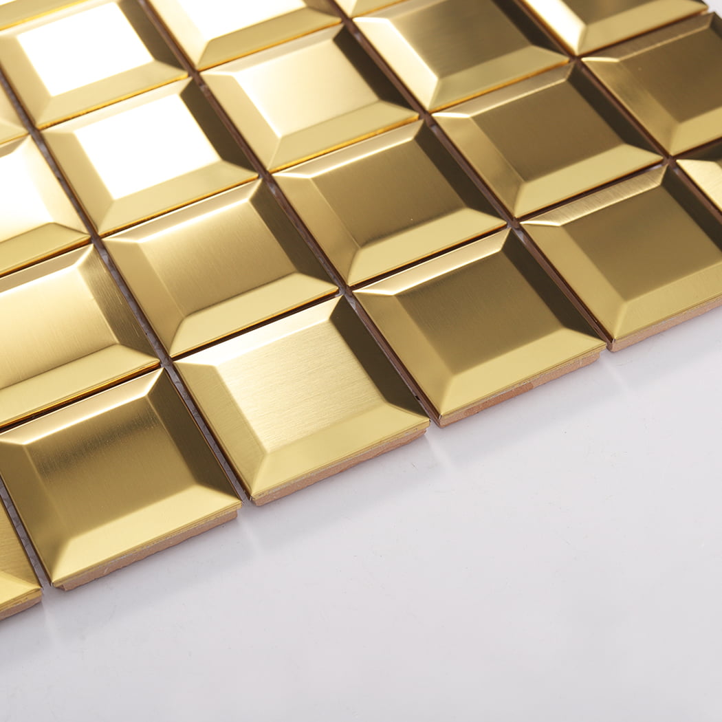 Angled side view of gold metal mosaic tiles showing thickness and edges