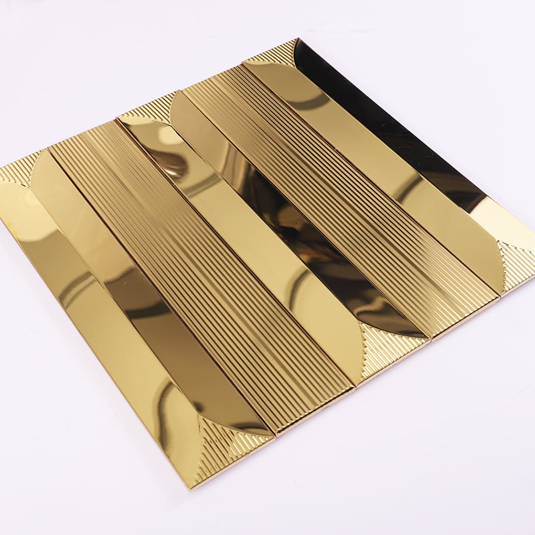 Angled perspective of gold metal tile sheet on white background