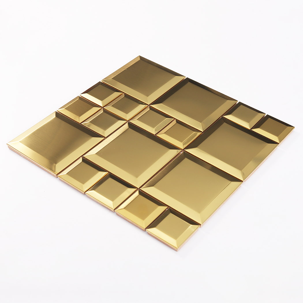 Angled view of gold stainless steel beveled square mosaic tile pattern